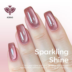 Modelones Gold gel polish offers glossy warmth for festive nails.