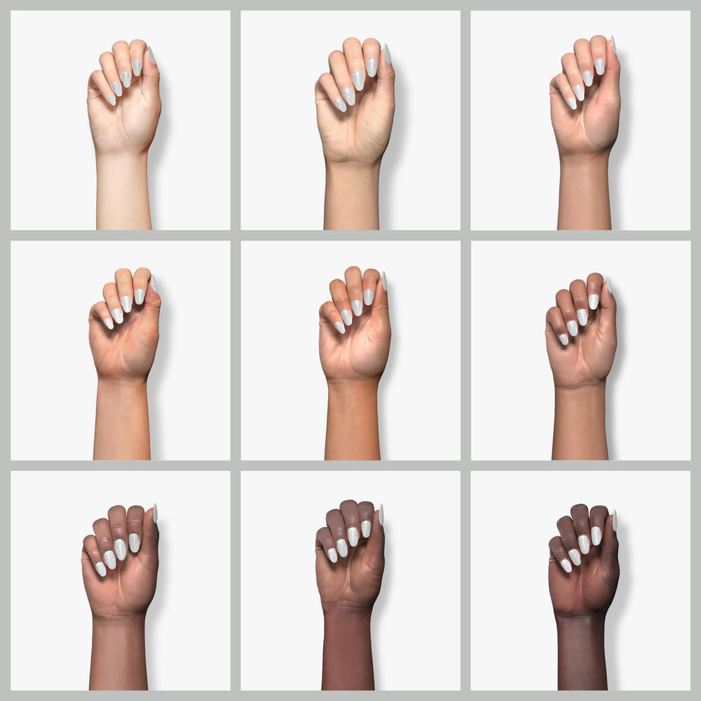 Swatch and brush of Modelones pastel silver gel polish for at-home use