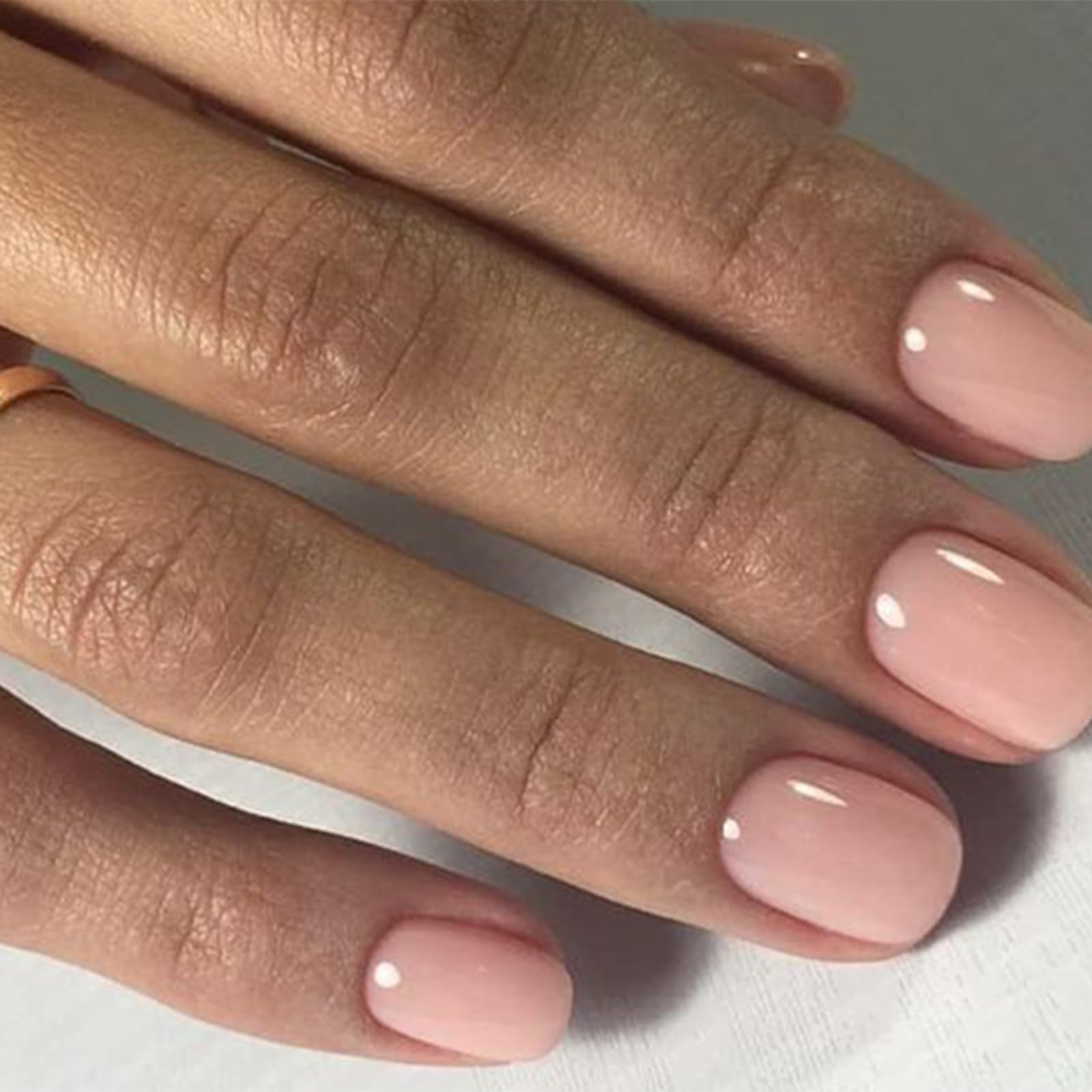 Modelones nail glue included for secure adhesion.