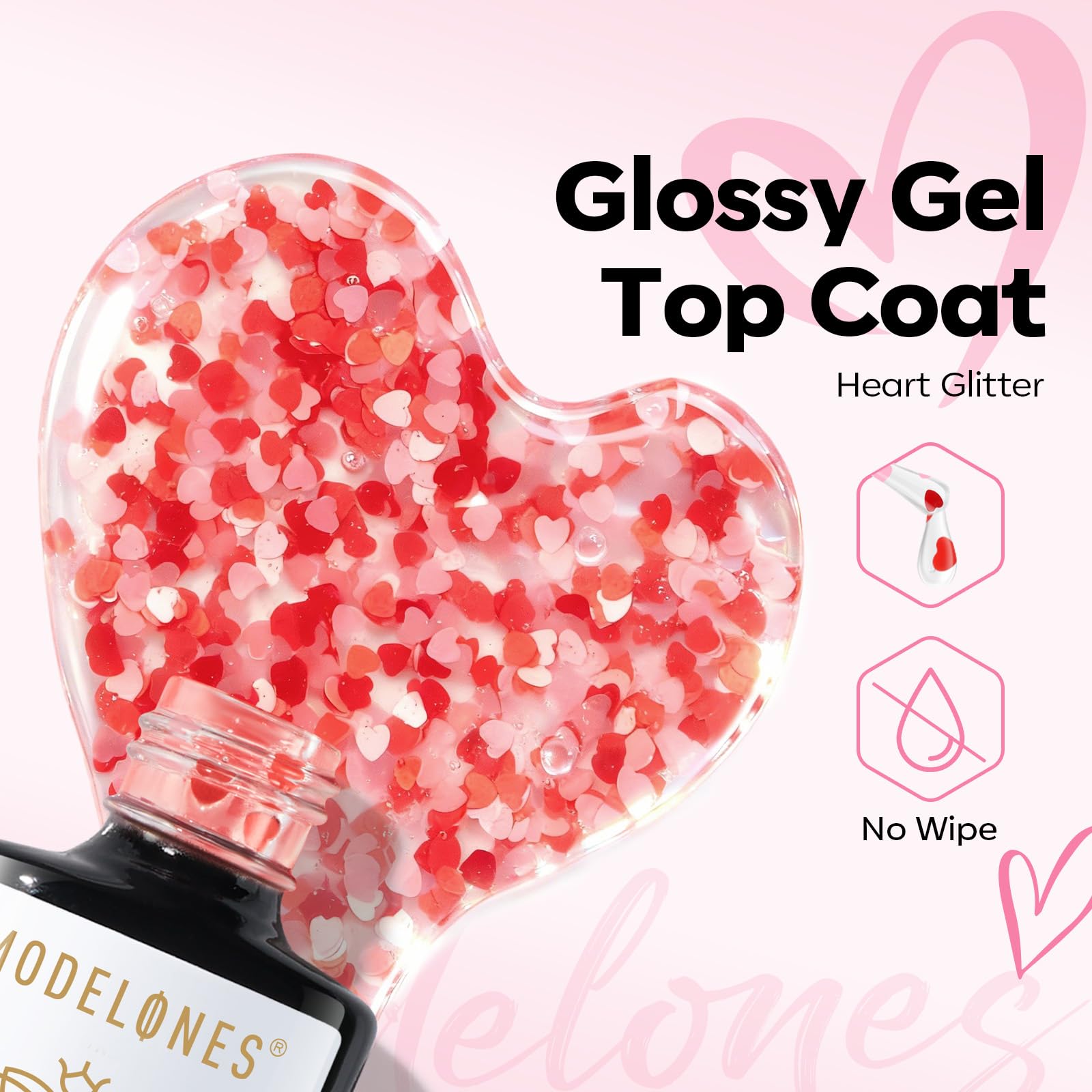 Close-up of red and pink heart sequins on Modelones top coat nails