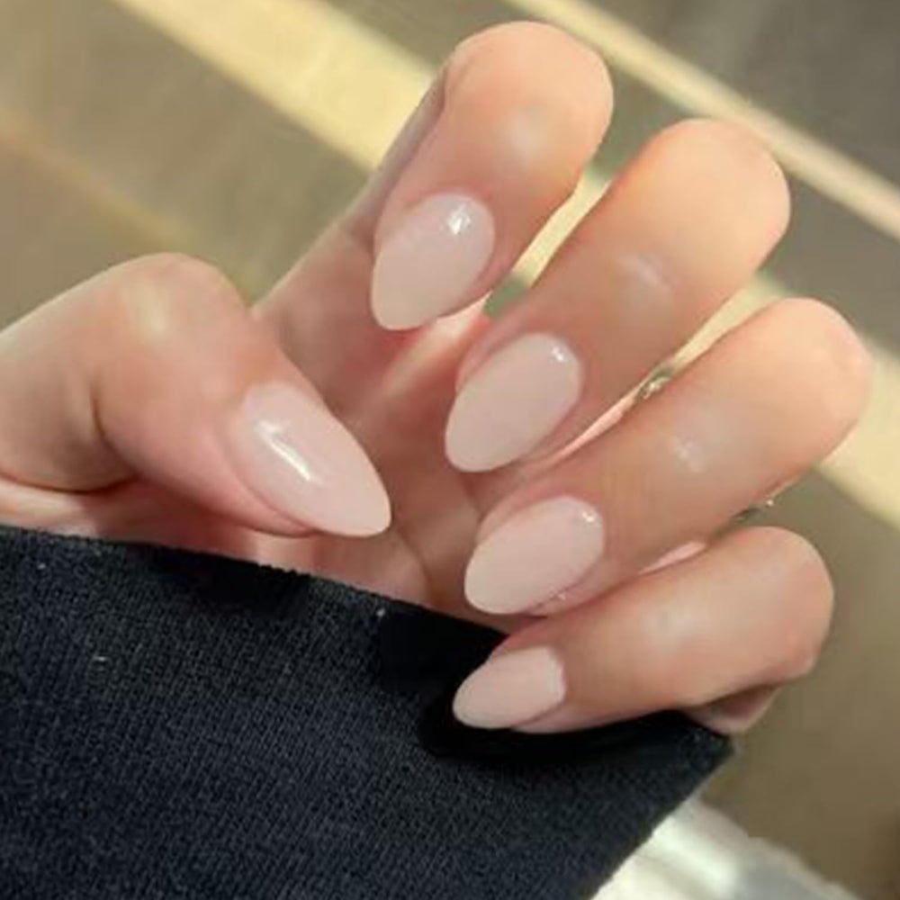 Modelones white nude press-on nails in almond shape for an easy, salon-like manicure.