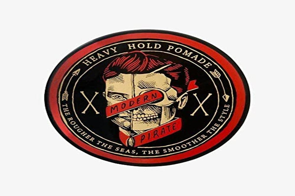Modern Pirate Heavy Hold Pomade bottle showing strong hold for all-day control.