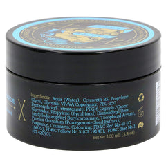 Modern Pirate pomade in hand applying for flexible brushable styling