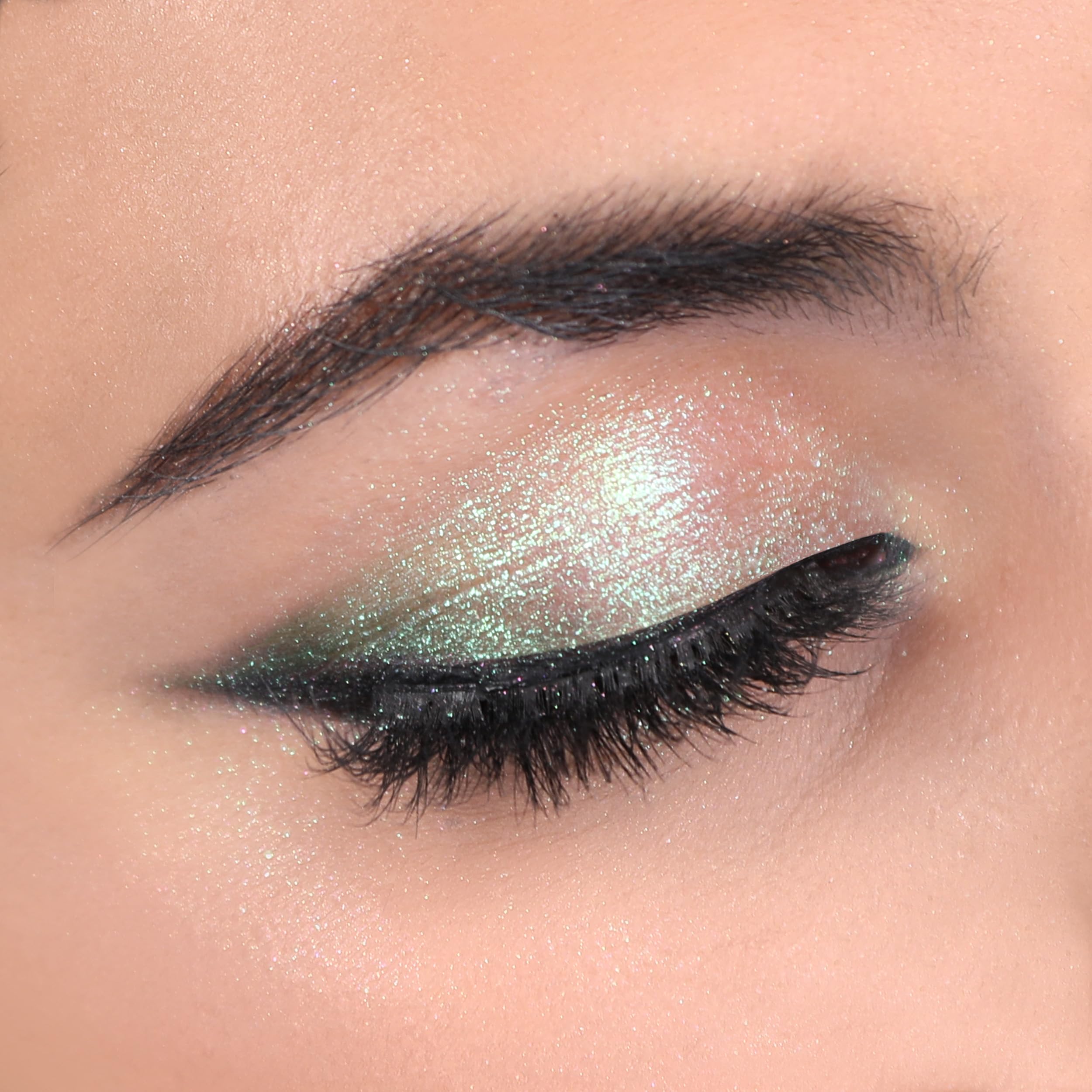 Moira Chroma Light Shadow Opal Gazed creamy formula gliding on skin