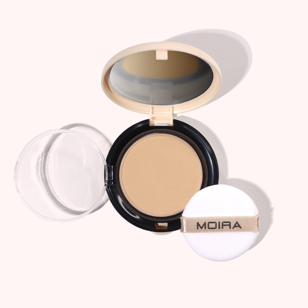 Moira Complete Wear Powder Foundation compact close-up with a natural matte finish.