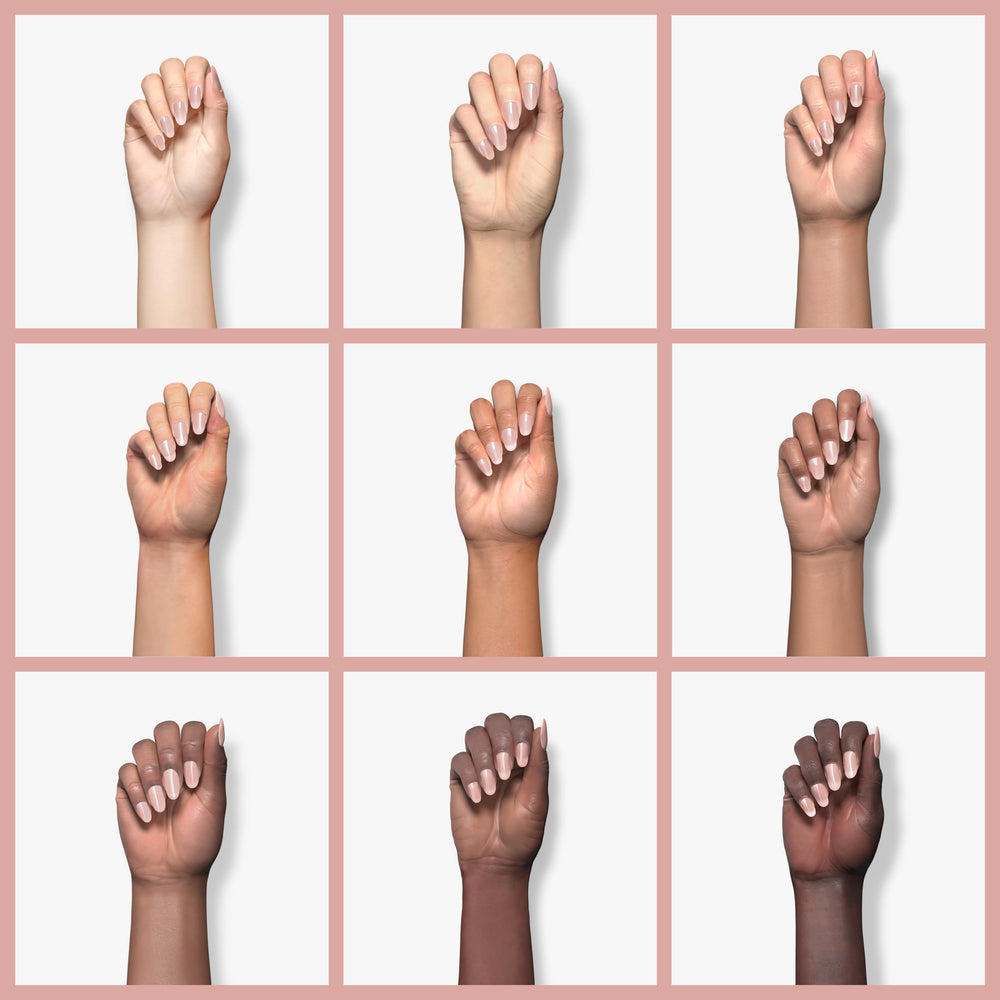 Molisaka nude acrylic powder on a false nail highlights durable finish and protective layer.