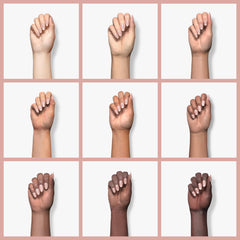 Molisaka nude acrylic powder on a false nail highlights durable finish and protective layer.