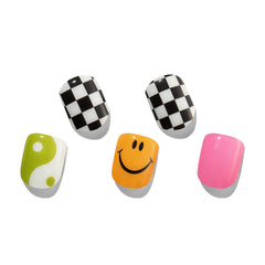 MOMSON rainbow unicorn nail wraps closeup showing glossy semi-cured finish for quick DIY nails.