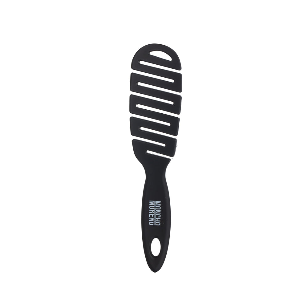 Moncho Moreno Mini Magic Brush travel-size detangler for on-the-go styling and frizz control.