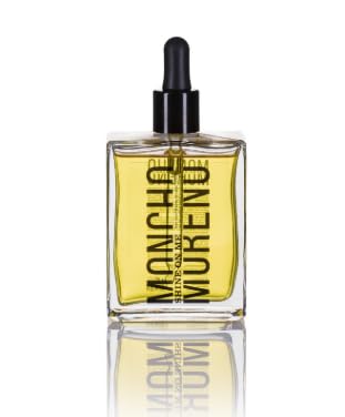 MONCHO MORENO Shine On Me bottle closeup showing glossy finish and frizz control