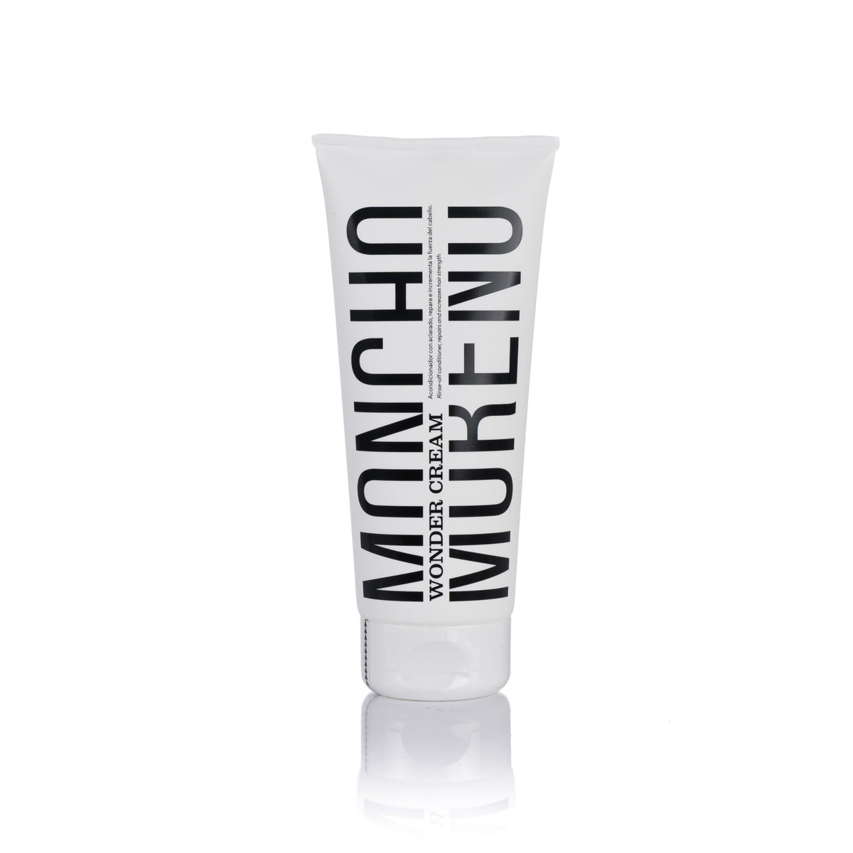 MONCHO MORENO Wonder Cream bottle showcases salon-grade conditioning for damaged hair.