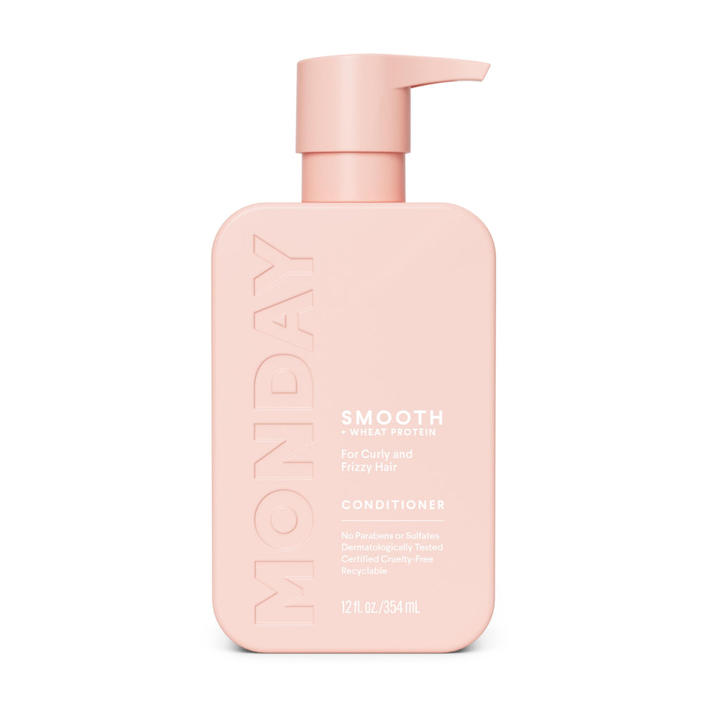 MONDAY Haircare SMOOTH conditioner bottle with frizz-control formula.