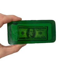 Money Soap hidden prize inside bar teaser emphasizing fun unboxing and exciting gift idea.