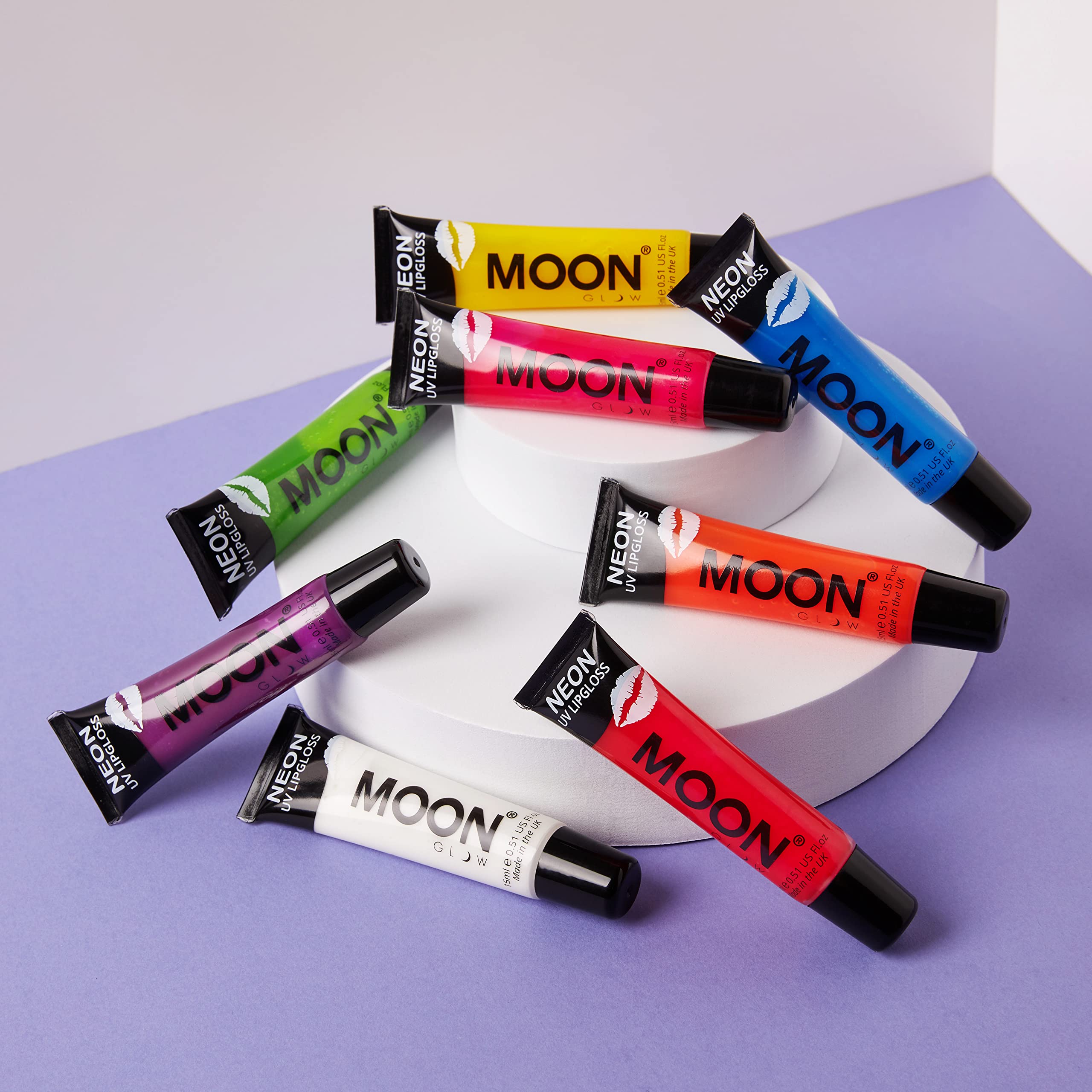 Moon Glow green apple lip gloss glows under UV light for neon pop