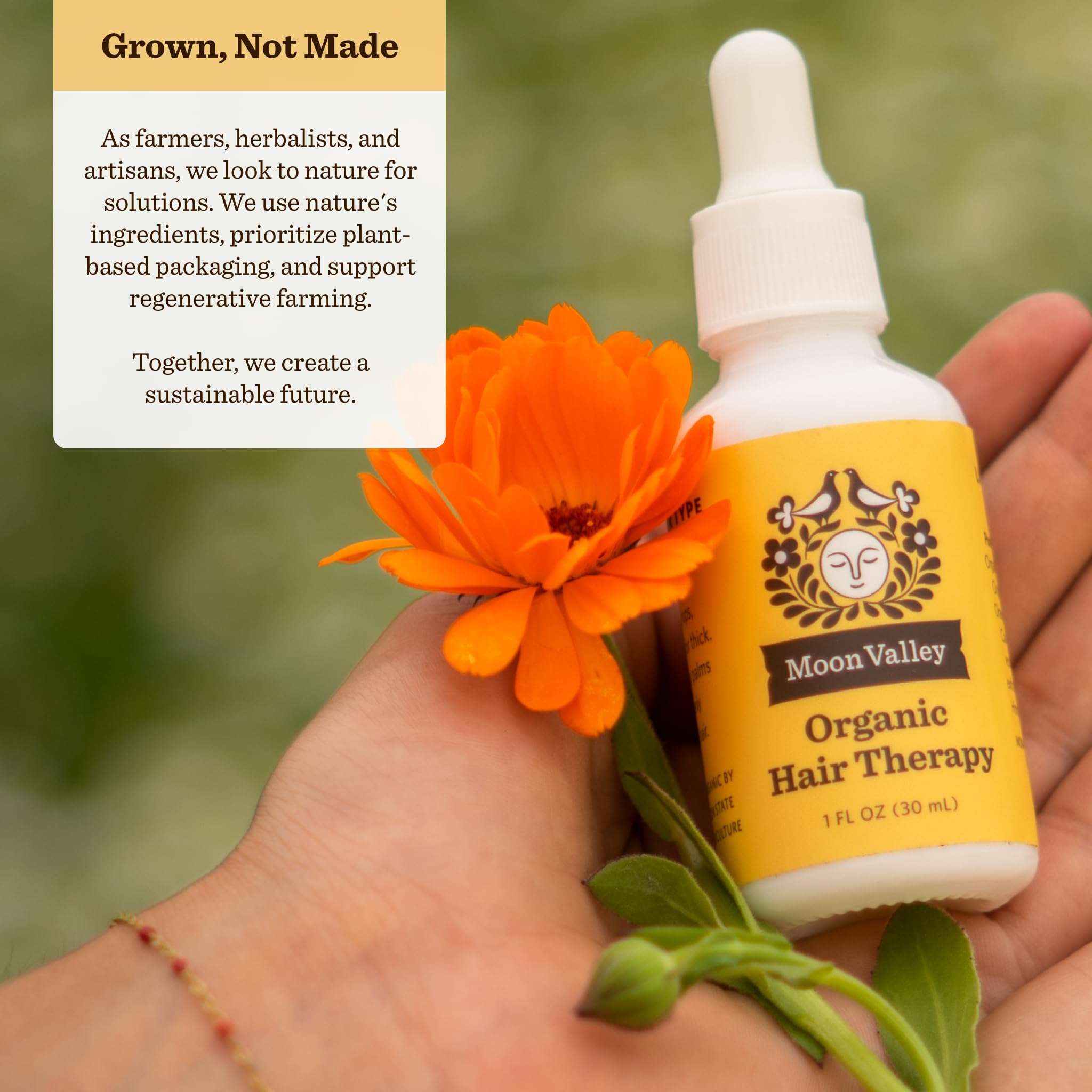 Dropper applying Moon Valley Organics Hair Therapy for easy usage.
