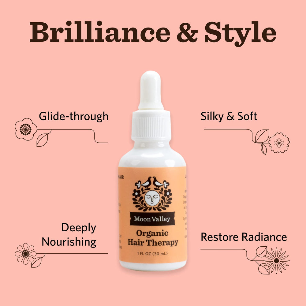 Moon Valley Organics Hair Therapy with argan oil droplets.