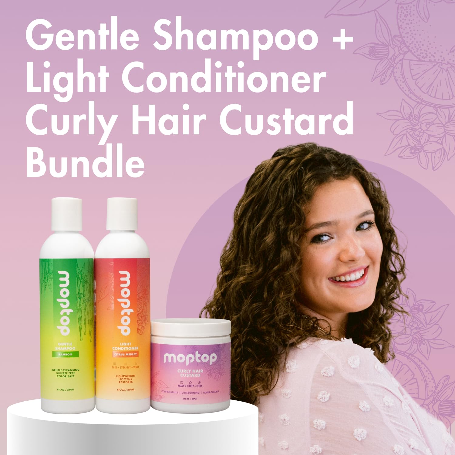 MopTop model with curly hair demonstrates defined, touchable curls.