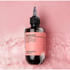 Moremo Water Treatment Miracle 10 apply on damp hair for smoothness.