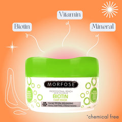 Hands applying Morfose Biotin Hair Mask on hair for moisture boost.