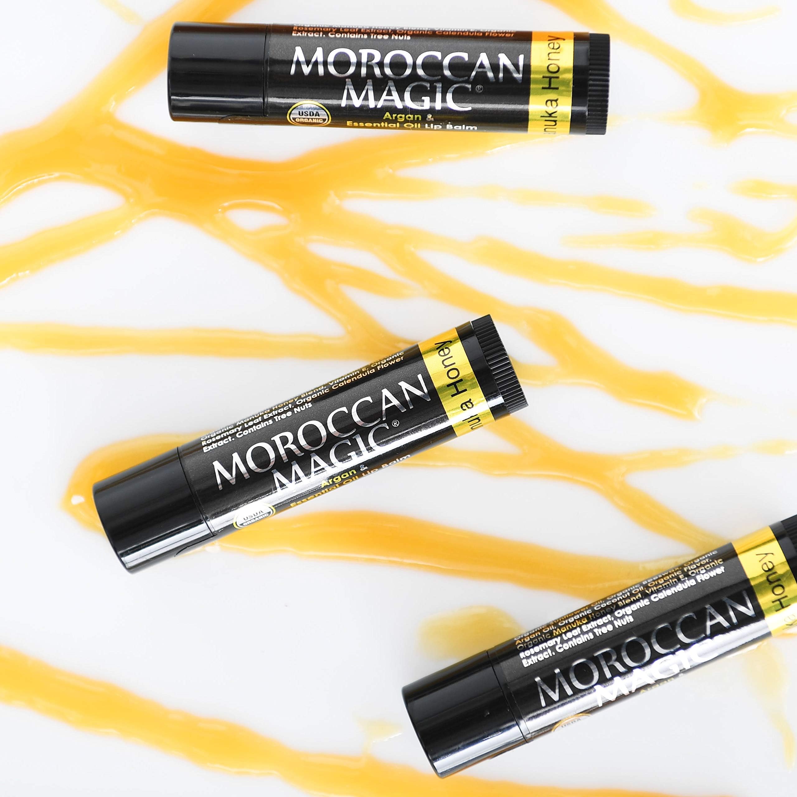 Box and tubes of Moroccan Magic lip balm shown for in-hand packaging.
