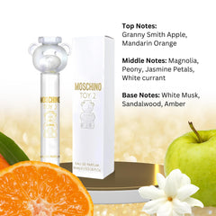 Closeup of Moschino Toy 2 mini EDP atomizer releasing a light mist