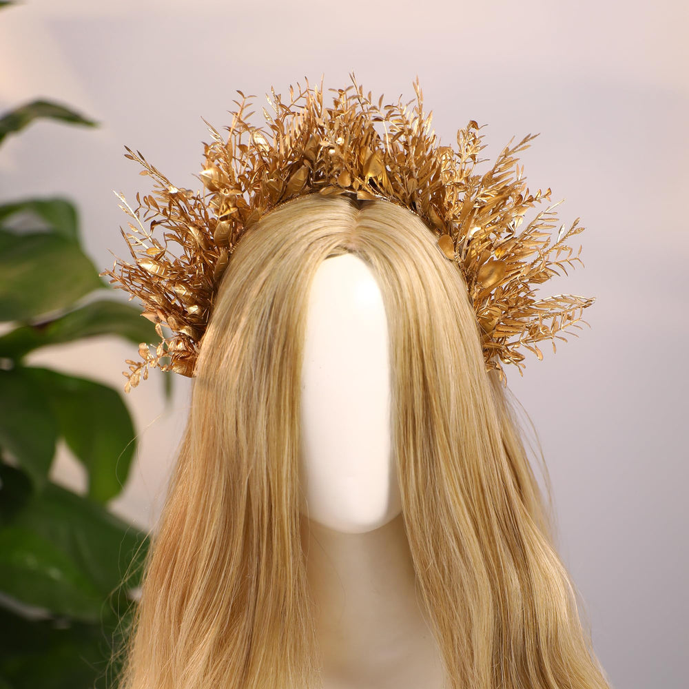 MOSTORY Handmade craftsmanship highlights a detailed floral halo on a regal headpiece.