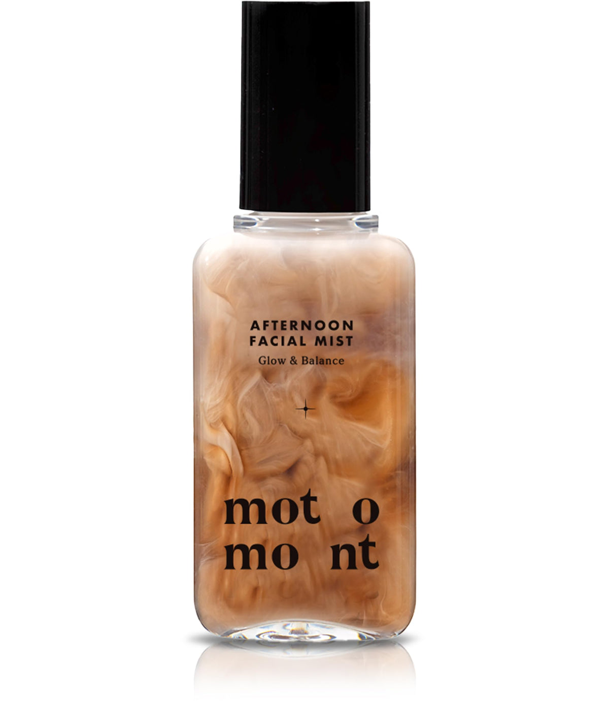 Motomont Milk Tea Mist bottle closeup highlighting premium packaging for hydrated, dewy skin.