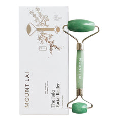 Mount Lai de-puffing jade roller close-up, reducing puffiness for a refreshed glow.