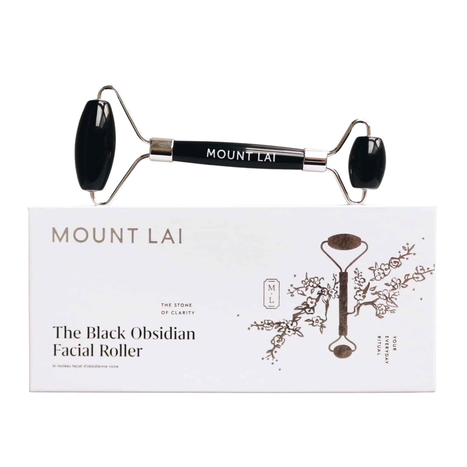 Mount Lai Warming Black Obsidian Roller on the face for improved circulation and relaxation