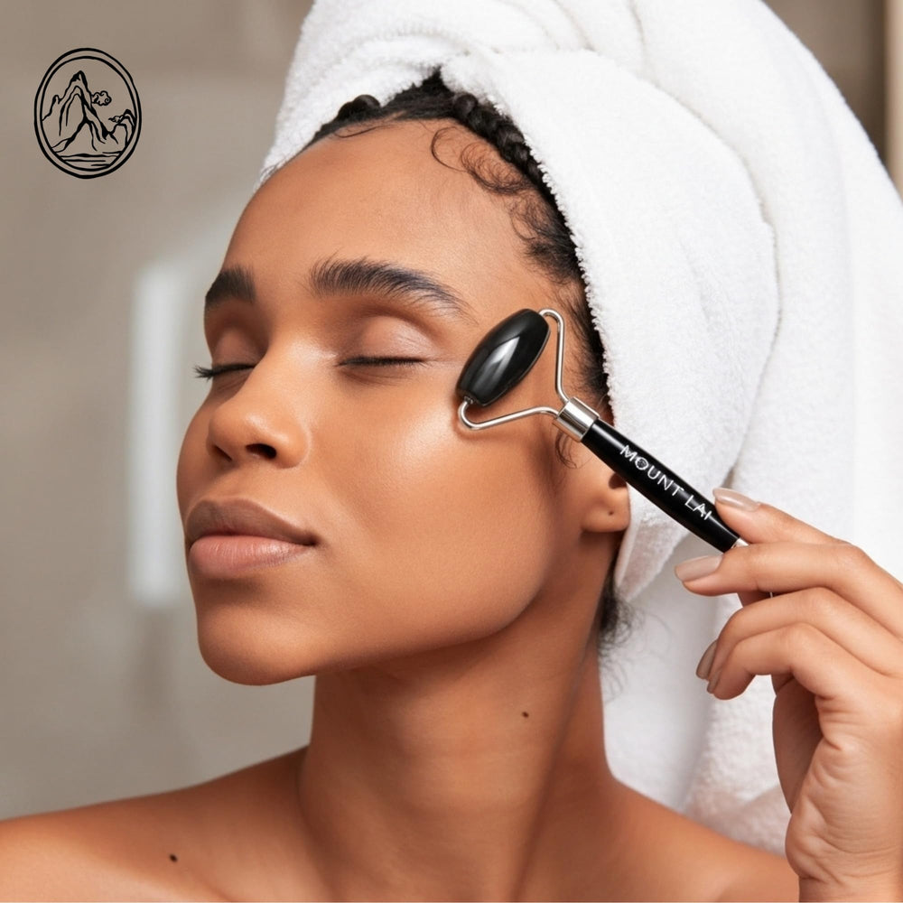 Mount Lai Warming Black Obsidian Roller used on under-eye area to help puffiness and absorption