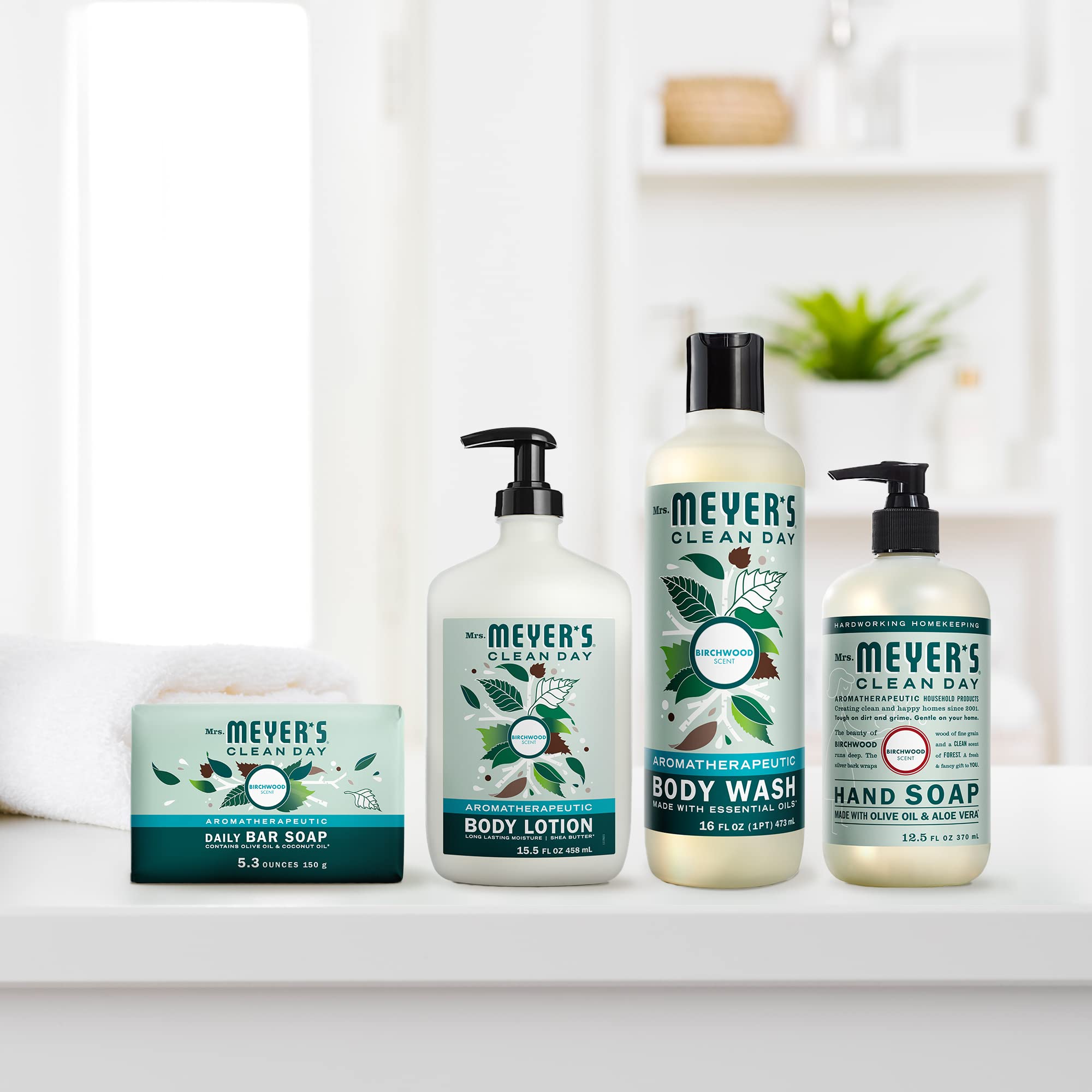 Unwrapped Mrs. Meyer's Clean Day Birchwood bar soap ready for use.