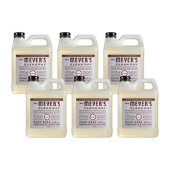 Mrs. Meyer's Clean Day Lavender refill bottle pour showing easy refilling and gentle cleansing.