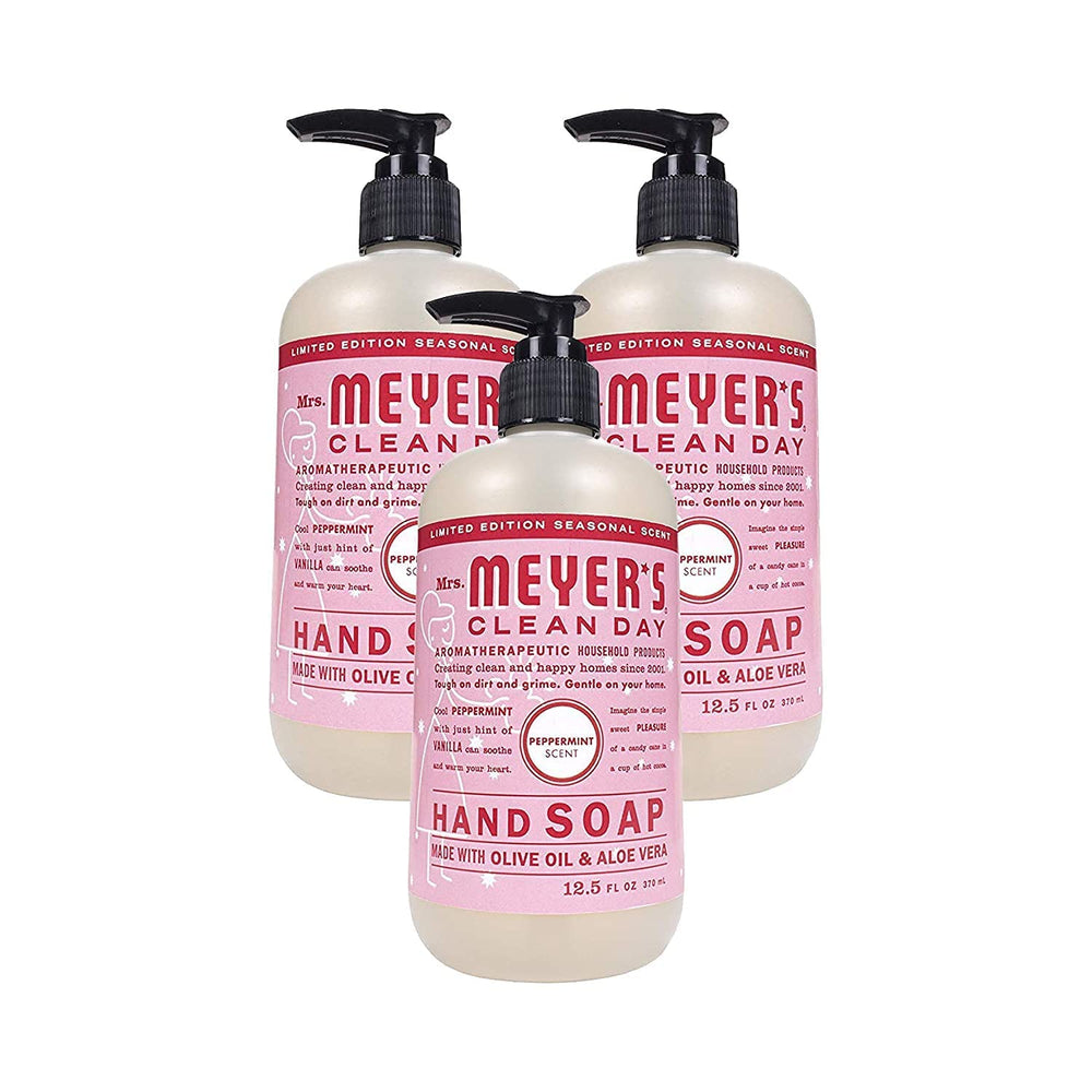 Mrs. Meyer's Clean Day Peppermint hand soap bottle on sink for a refreshing cleanse.