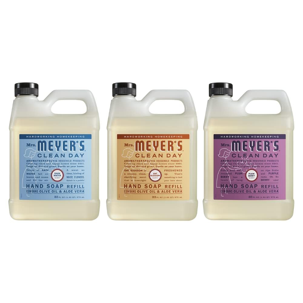 Mrs. Meyer's Clean Day Rain Water refill bottle on a sink for gentle hand cleansing.