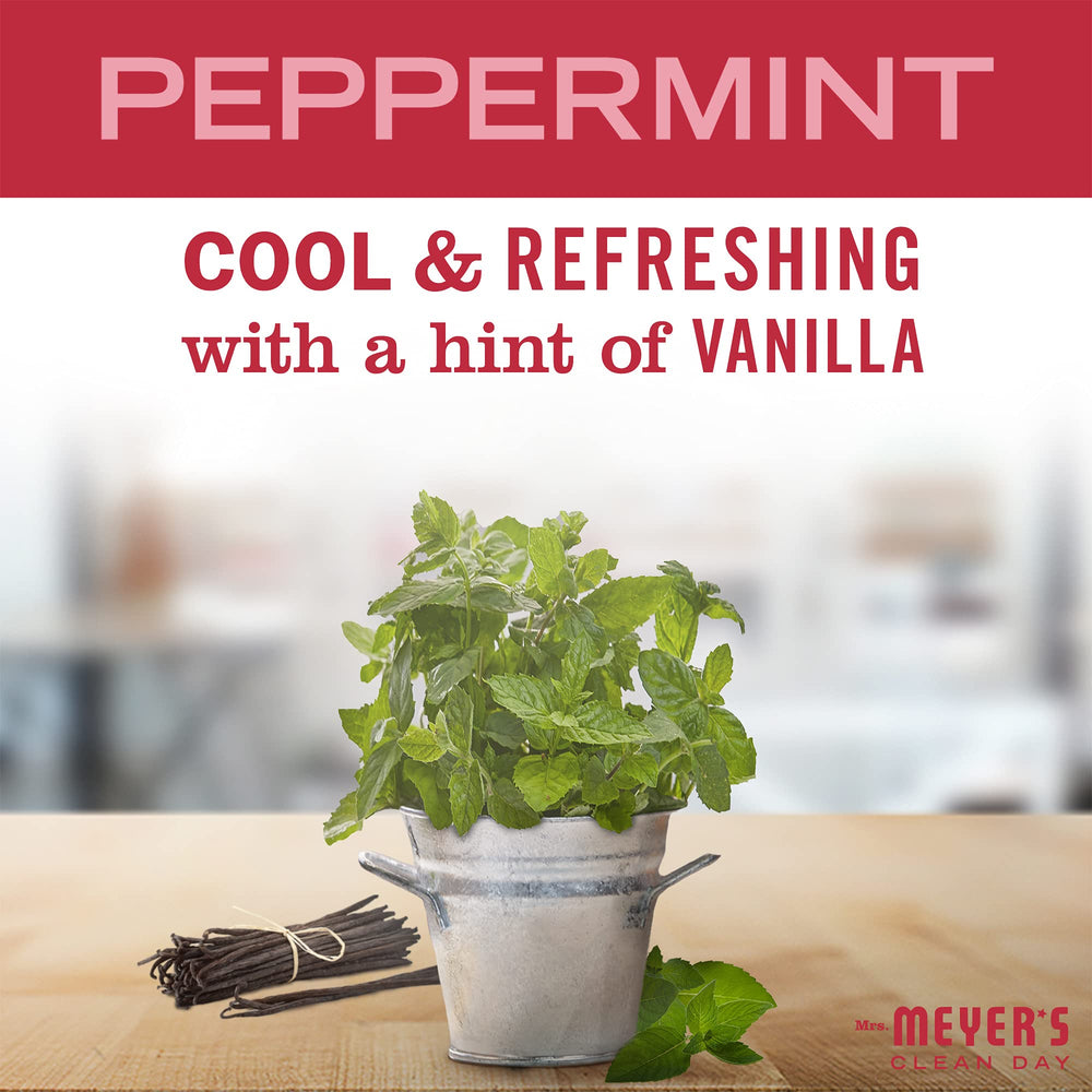 Label closeup reveals peppermint with vanilla notes for a cozy scent