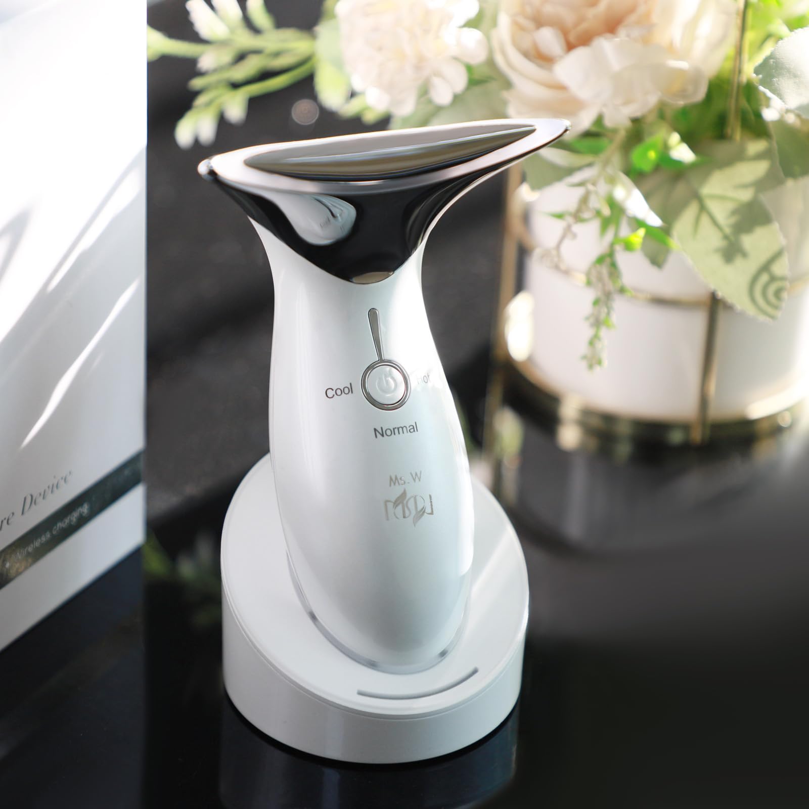 Ms.W gift box includes massager, USB cable, base, and manual.