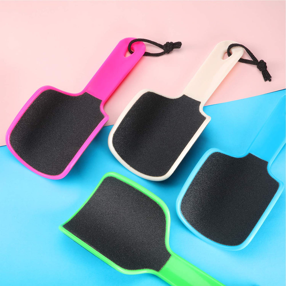 Mudder dual-sided curved foot file demonstrates dual grit for exfoliation.