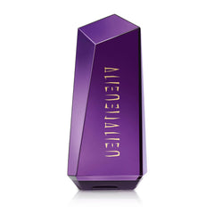 Mugler Alien body lotion bottle bathed in sunlit glow for radiant skin