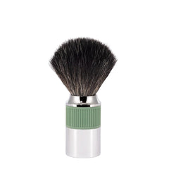 MÜHLE NEO shaving brush with chrome handle and sage-green grip for secure, comfortable lather.