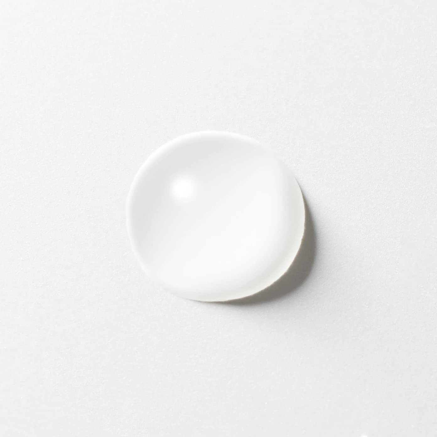 MUJI Mild Cleansing Oil applied to dry skin for effective makeup removal.