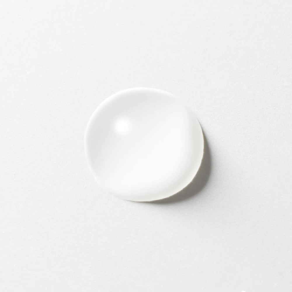 MUJI Mild Cleansing Oil applied to dry skin for effective makeup removal.