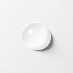 MUJI Mild Cleansing Oil applied to dry skin for effective makeup removal.