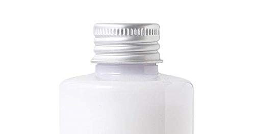 MUJI milky lotion texture close-up emphasizing smooth, non-irritating care.