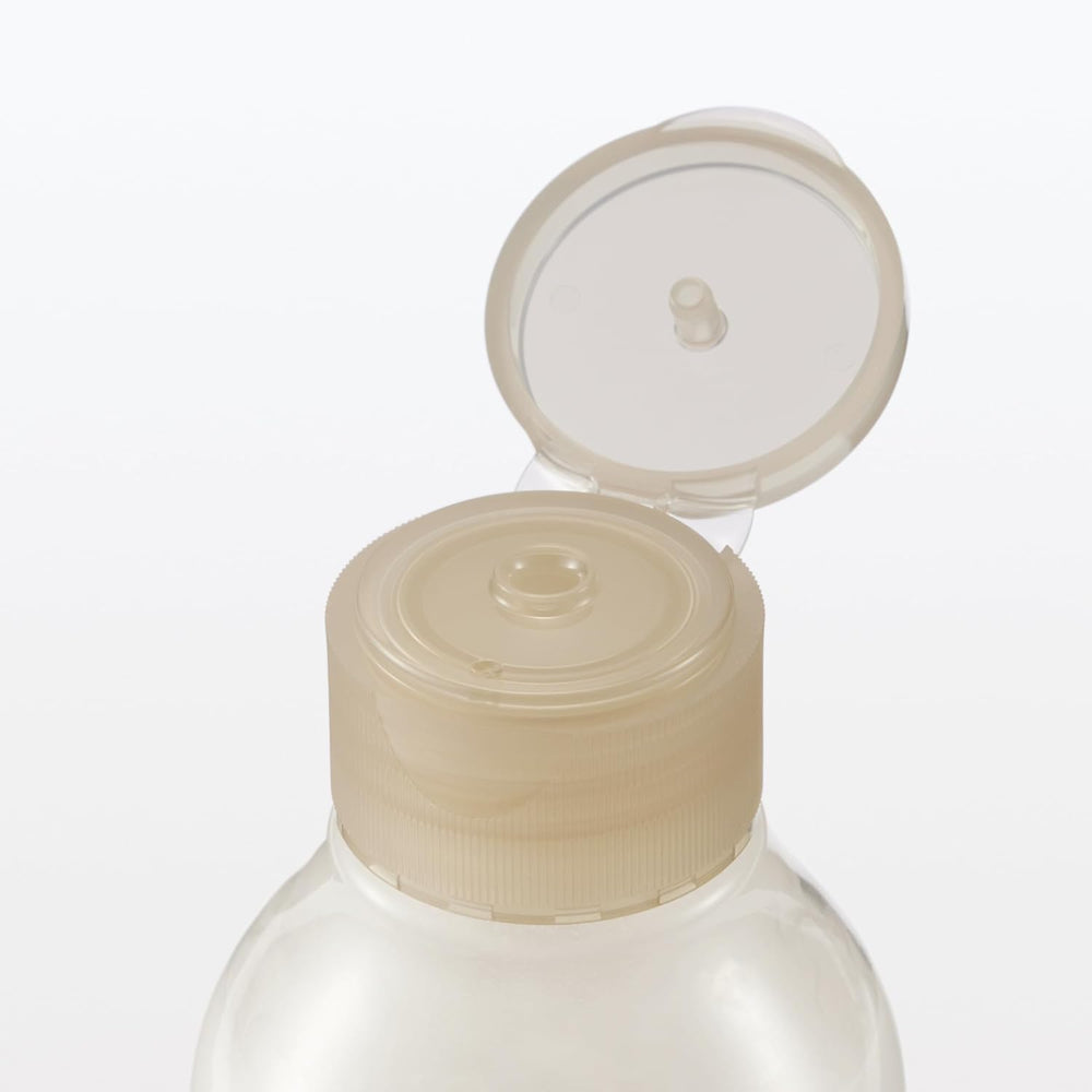 MUJI lotion on bathroom counter ready for a simple morning skincare routine.