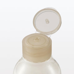 MUJI lotion on bathroom counter ready for a simple morning skincare routine.