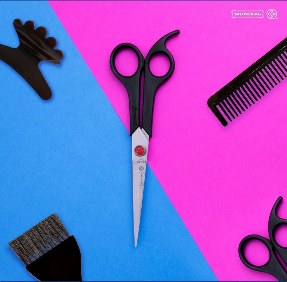 Mundial Red Dot barber shears with ergonomic handle for comfortable long use.