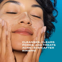 Murad Acne Control Clarifying Cleanser being applied to face for pore cleansing.
