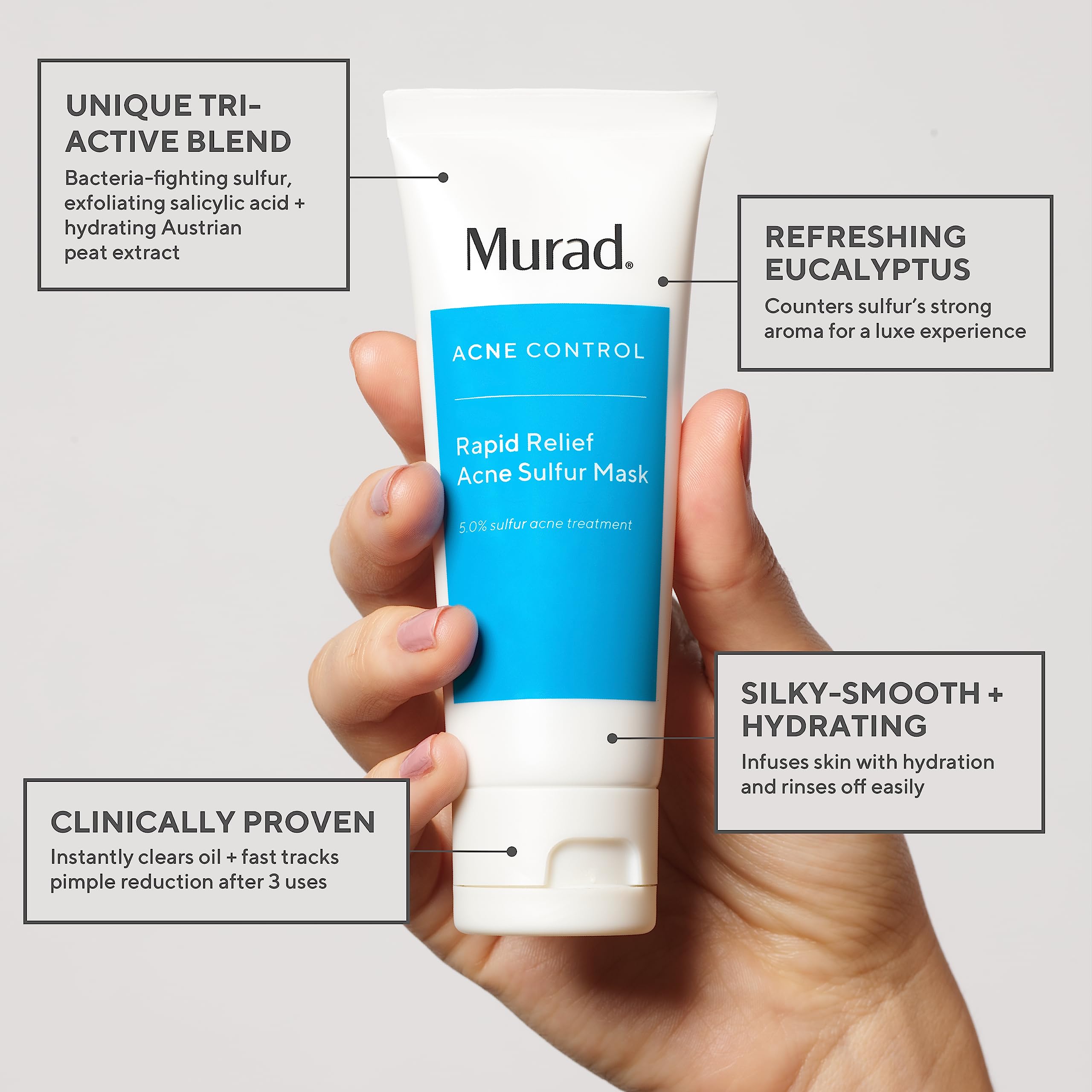 Murad Rapid Relief Acne Mask application spread across skin for even layer.