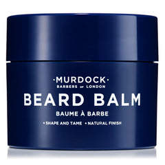 Murdock London beard balm in hand ready for easy daily application and styling.