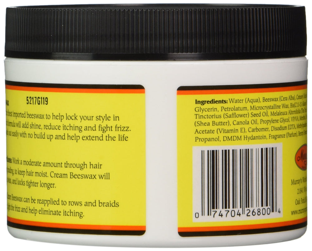 Murray's Beeswax Cream being applied for smooth, controlled styling.